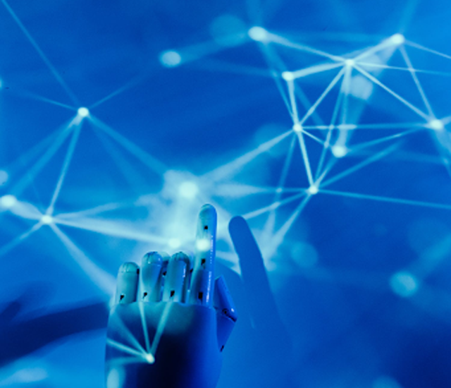 The future of the digital world is still unknown, but what is essential is that we are productive today. (Credits: “Robot's Hand on a Blue Background,” by Tara Winstead, licensed under Pexels.)