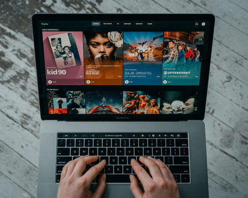 Live streaming is now being used by e-commerce companies to market their products and services. (Tech Daily, Macbook Pro on white table, Unsplash License)